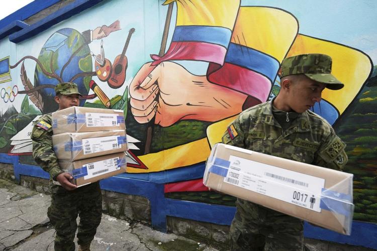 Polls open in Ecuador's presidential runoff as voters choose between incumbent and a leftist lawyer