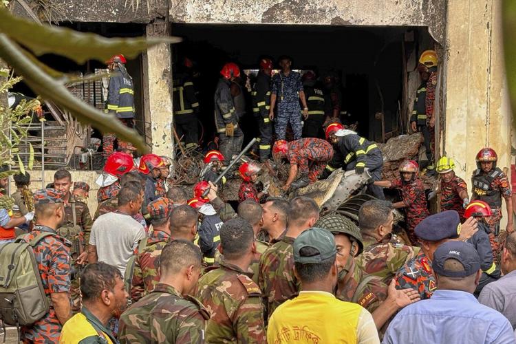 A Bangladesh Air Force jet crashes into a Dhaka school and kills 18