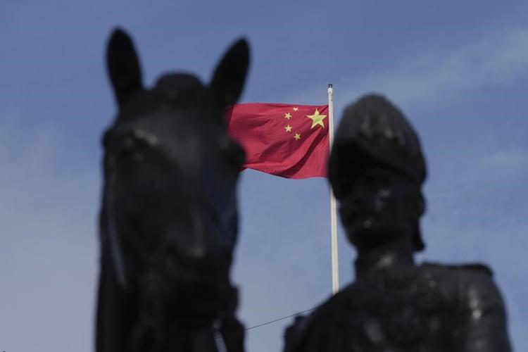 UK resists calls to label China a threat following claims a Beijing spy worked in Parliament