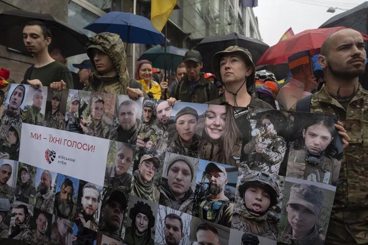 LGBT soldiers in Ukraine hope their service is changing attitudes as they rally for legal rights