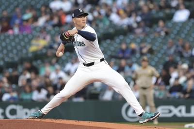 Mariners righty Bryan Woo loses perfect game in 7th inning on homer by Fernando Tatis Jr.