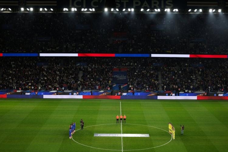 Players and fans remember victims of 2015 Paris terror attacks before France-Ukraine soccer match