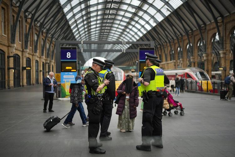 UK police charge man with attempted murder over train stabbing that wounded 11 people