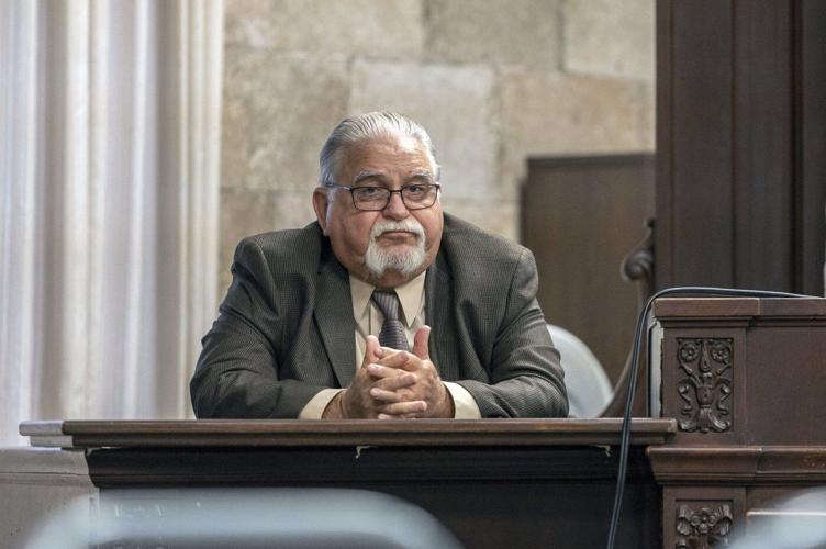 An ex-officer who died in an apparent suicide before his federal trial was barred from having a gun