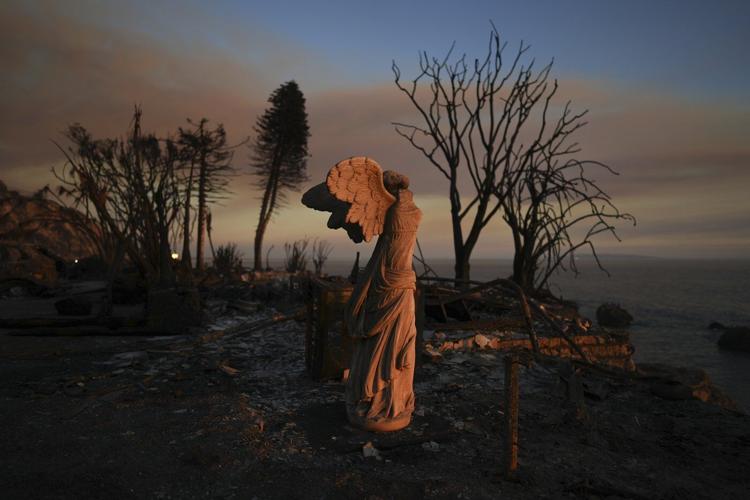 With their Los Angeles-area homes still smoldering, families return to search the ruins for memories