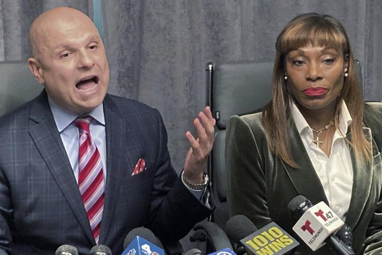 Former top aide to New York City's mayor surrenders to DA's office to face charges