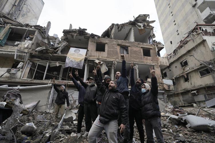 Israel says it struck Hezbollah weapons smuggling sites in Syria, testing a fragile ceasefire