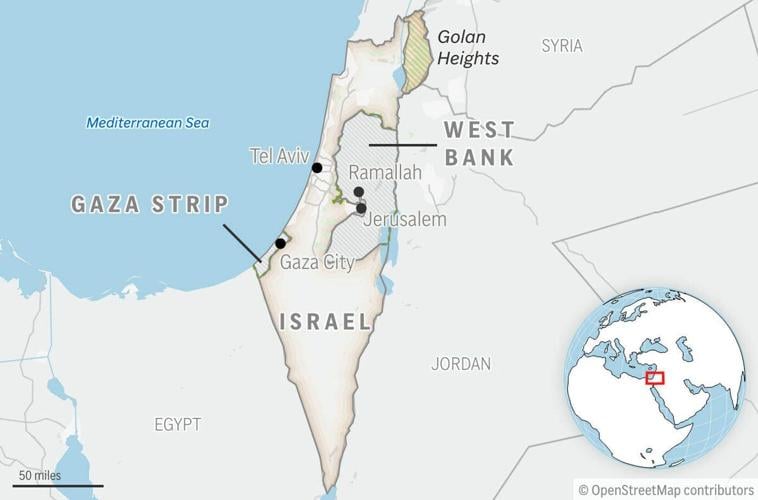 Israeli forensics experts examine remains handed over by militants in Gaza
