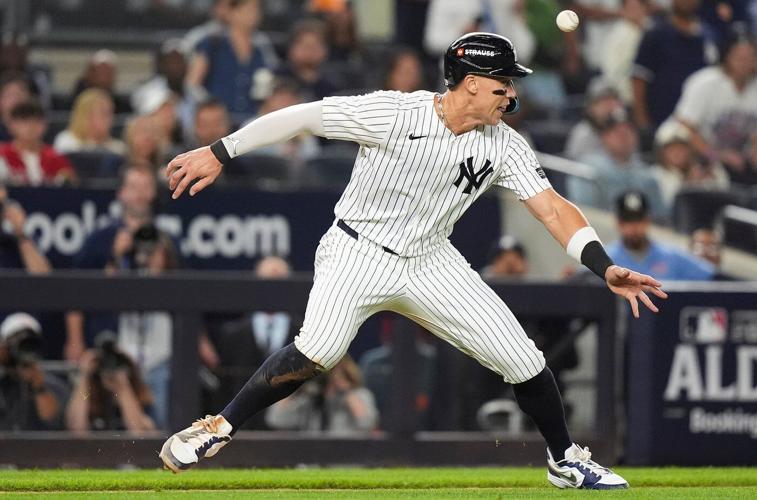 Aaron Judge does it all and rescues Yankees with `amazing swing' against Blue Jays