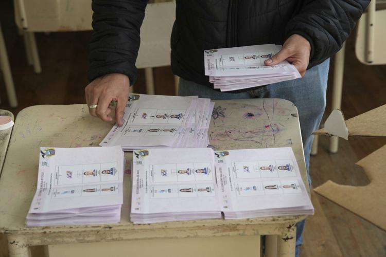 Ecuador's incumbent president and a leftist lawyer again vie for the top job in election runoff