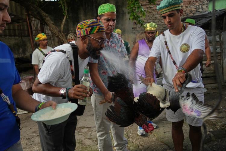Cuba's Santeros offer gifts and ask deities for peace as tensions rise with US