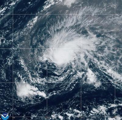 Hurricane Isaac and Tropical Storm Joyce move through the open Atlantic far from land