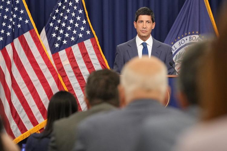 Fed leaves interest rate unchanged but with 3 dissents as Warsh praises 'good family fight'