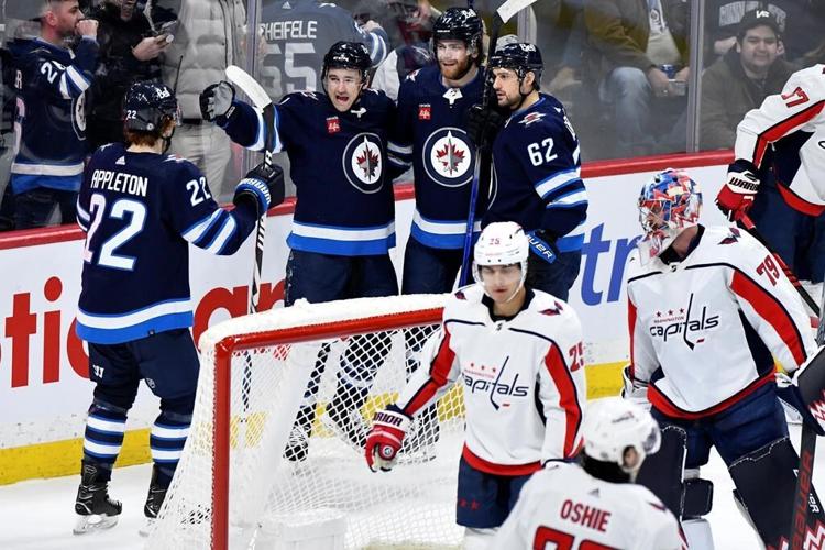 Hellebuyck helps Jets soar past Capitals 3-0