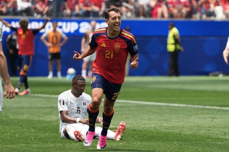 Mikel Oyarzabal's 2 goals send dominant Spain past Austria 3-0 and into round of 16 at the World Cup