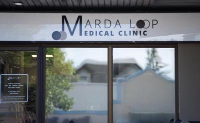 Alberta premier threatens sanctions against Calgary clinic set to charge fees