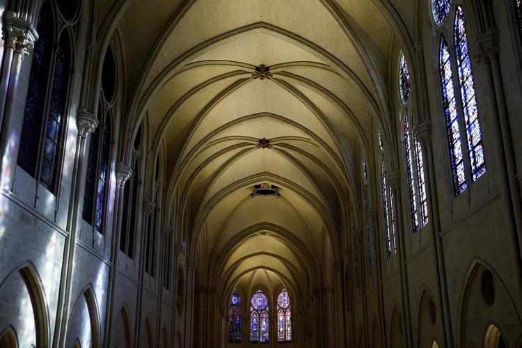 The Latest: The famed Notre Dame Cathedral in Paris reopens to great fanfare