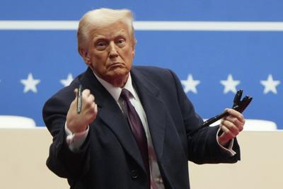The autopen is a time-tested tool for presidents' signatures. Here's why Trump says Biden misused it