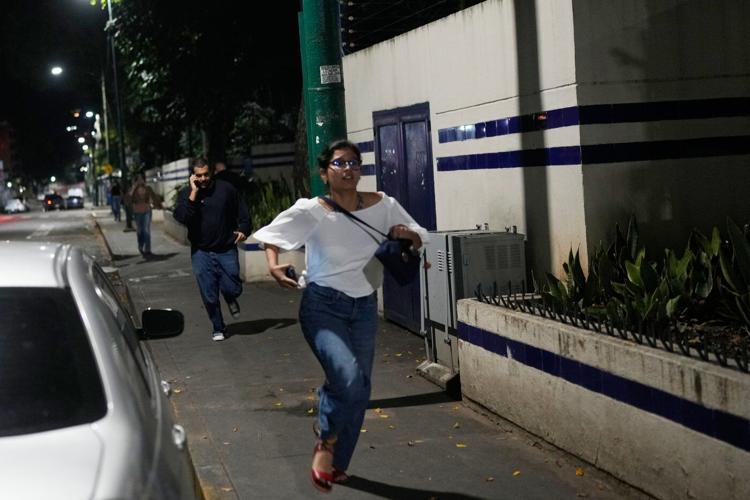 Behind the photo: How a woman running from US bombs in Venezuela captured the night's fear and chaos
