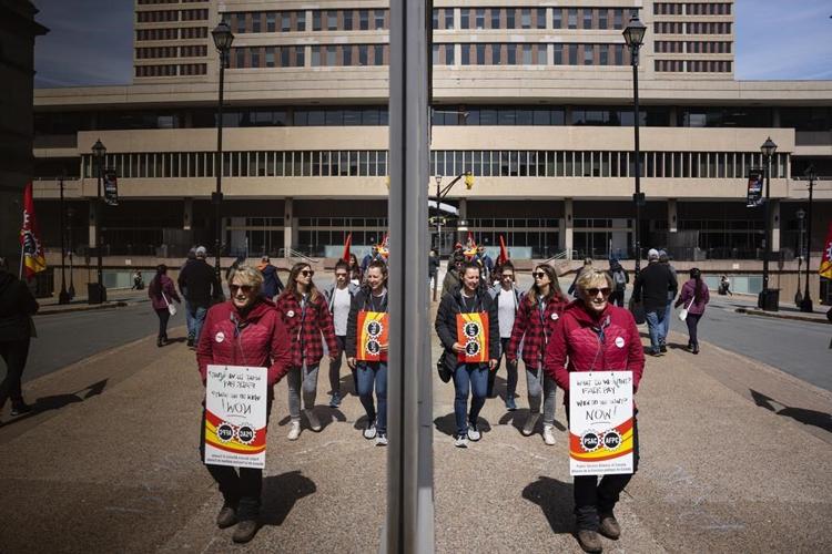 Striking public servants block access to government buildings and key infrastructure