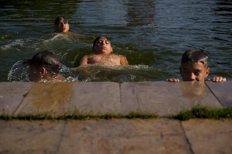 'It's hell outside': Sizzling heat wave in parts of southern and central Europe prompts alerts