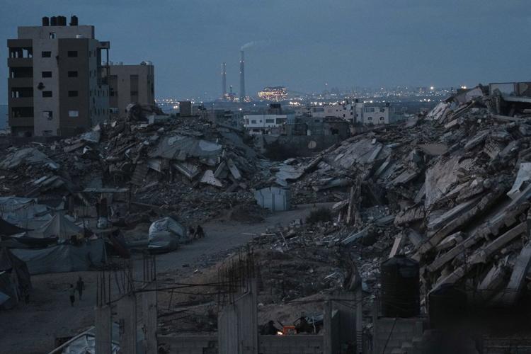 Israeli forces open fire a kilometer away from Gaza aid site, killing 3, health officials say