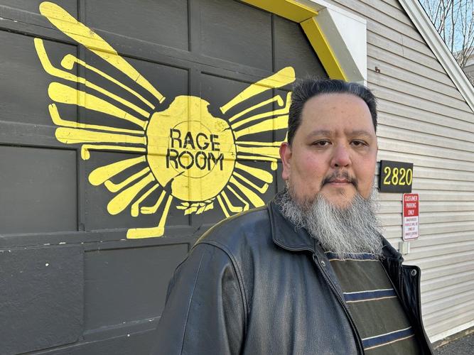 Clients of Halifax 'rage room' take aim at portraits of U.S. President Donald Trump