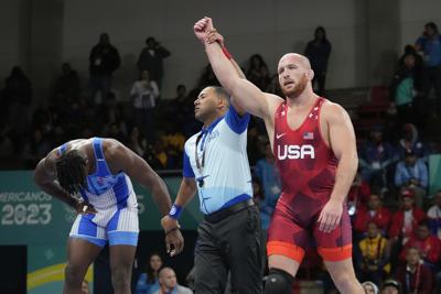 Wrestling gold medalist Kyle Snyder pleads to lesser charge after arrest in prostitution sting
