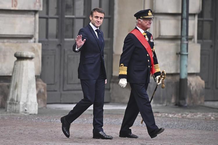 France's president gets a ceremonial welcome as he starts a 2-day state visit to Sweden