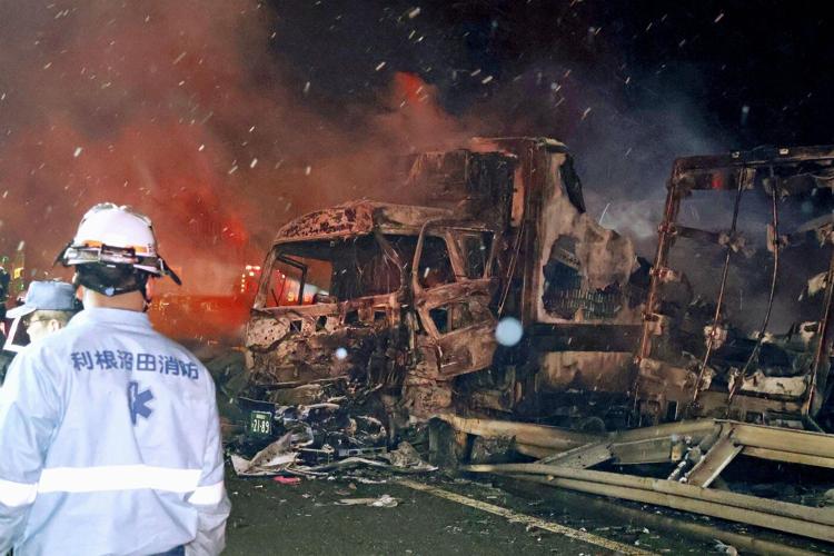 A massive crash on a highway in Japan kills 1 person and injures 26 as the holiday season starts