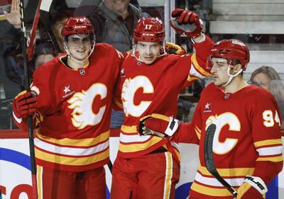 Sharangovich scores twice as Flames keep playoff hopes alive