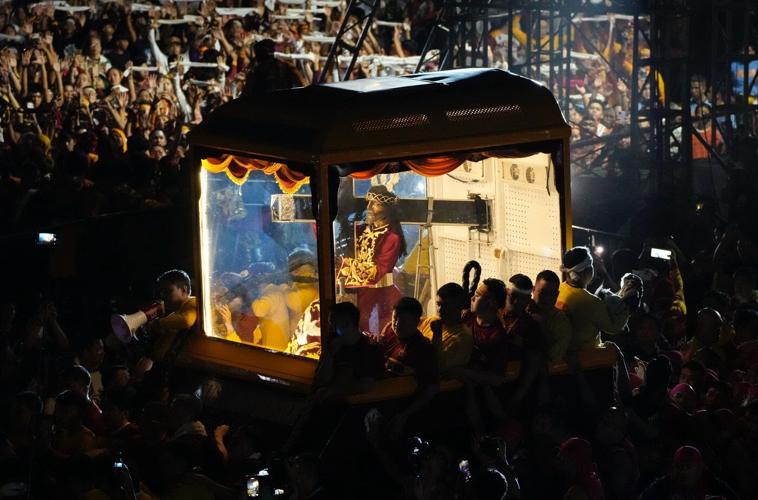 Filipino Catholics express outrage over corruption scandal during massive religious procession
