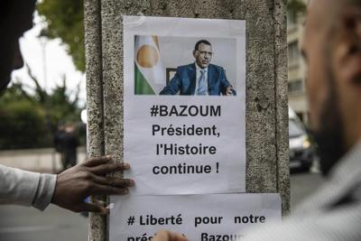 Niger's ousted president is said to be running low on food under house arrest, 2 weeks after coup