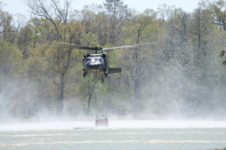 Texas wildfire prompts evacuations as Arkansas and Florida also battle blazes