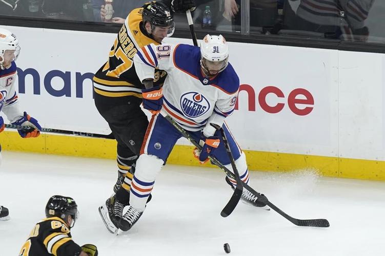 Oilers escape McDavid scare, win 3-2 to snap Bruins' streak