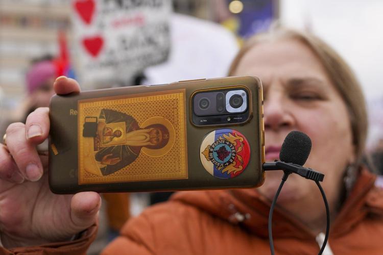 Serbia's striking students and populist president hold parallel rallies as tensions spike