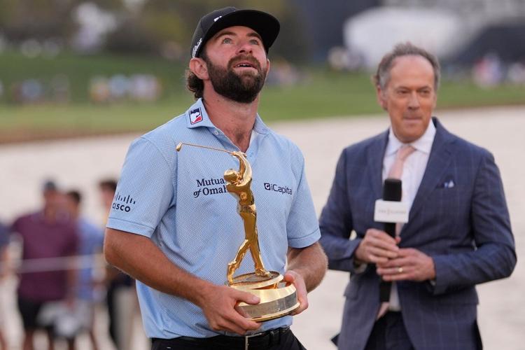Cameron Young is clutch on the island green and rallies to win The Players Championship