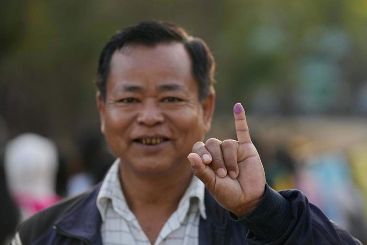 Photos show Myanmar holding its first election since the military seized power
