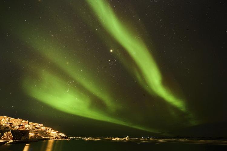 Greenland's leader says the island 'is ours' in defiance of message from Trump