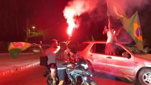 Thousands of people in northern Lebanon celebrate Brazil's victory over Japan
