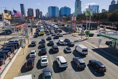 A $15 toll to drive into part of Manhattan has been approved. That's a first for US cities
