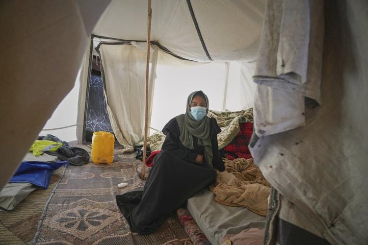 A pregnant woman under Israel's blockade in Gaza's ruins fears for her baby