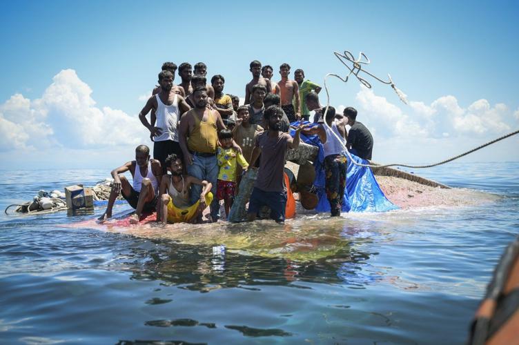Sri Lanka's navy rescues 102 Rohingya refugees found adrift aboard a fishing trawler
