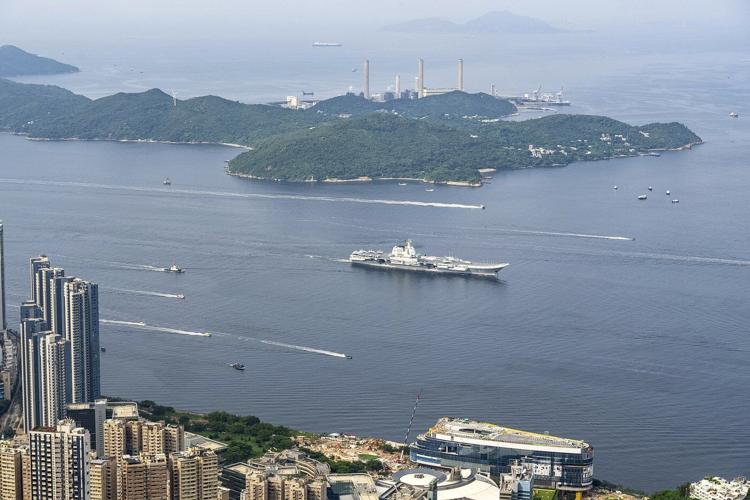 Chinese aircraft carrier sails into Hong Kong to boost patriotism