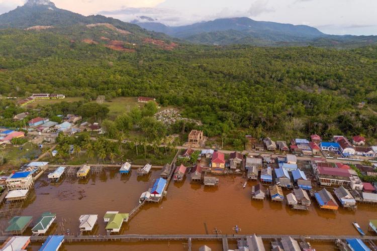 Global demand spurring Indonesia's mining boom comes at a cost for many communities