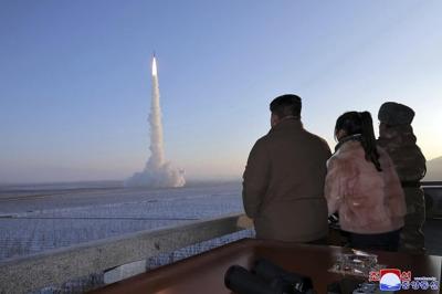 North Korea's Kim again threatens use of nukes as he praises troops for long-range missile launch
