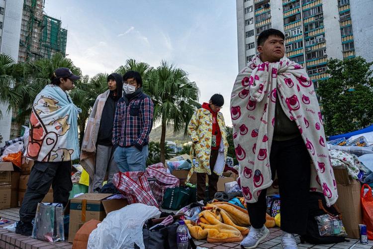 Hong Kong fire victims to return to burned homes, grieving losses and grappling with trauma