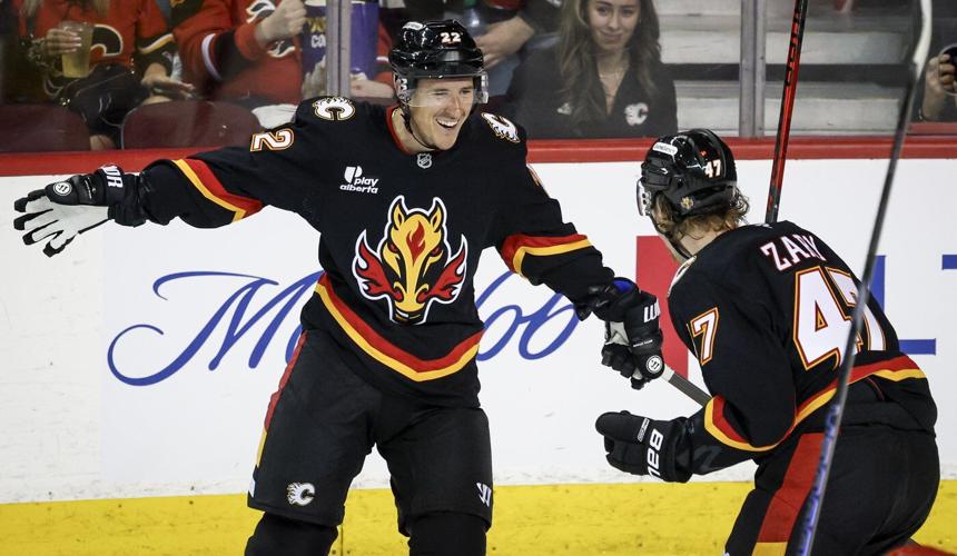 Farabee leads Flames to 5-4 win over Hurricanes