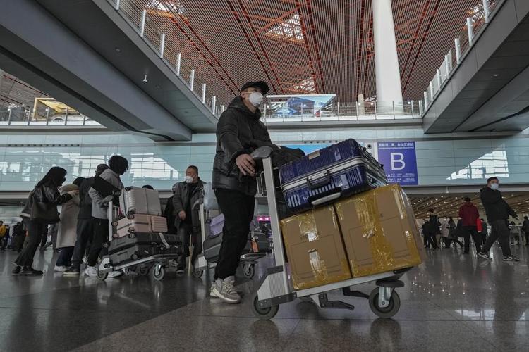 Travelers rush to take advantage of China reopening
