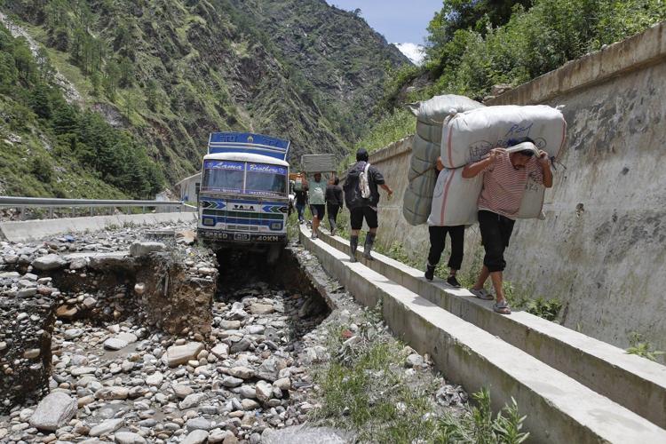 Rescuers search for 19 missing and recover 9 bodies after flooding in Nepal